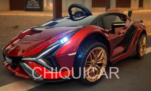 Batería coche infantil Lamborghini Sian 12 voltios con RC metalizado rojo ruedas de goma y silla en piel