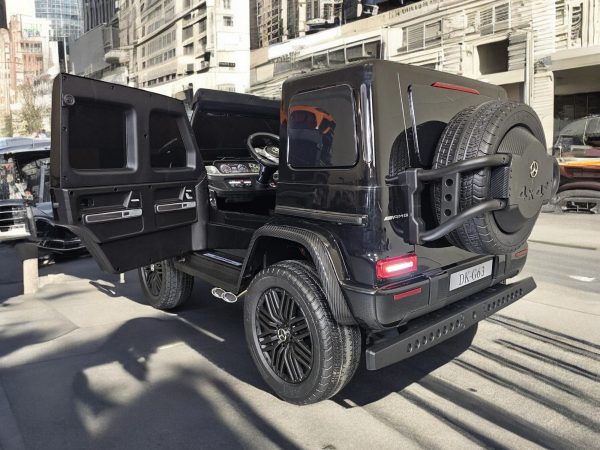 Coche para niños Mercedes G63 AMG 4×4 24 voltios 2 personas negro metalizado - Imagen 6