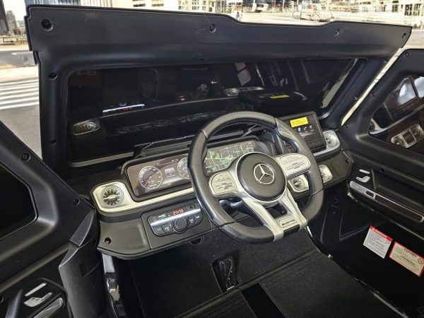 Coche para niños Mercedes G63 AMG 4×4 24 voltios 2 personas negro metalizado - Imagen 4